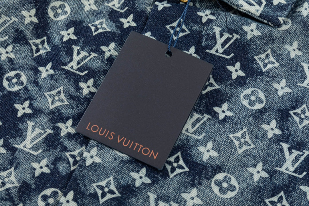 L's washed denim shirt with logo all over it